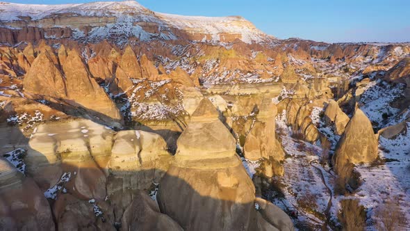 Rock Formations of Cappadocia in Winter on Sunny Day alt