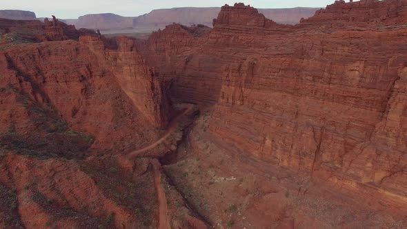 Flying towards Onion Creek narrows in the Utah desert alt