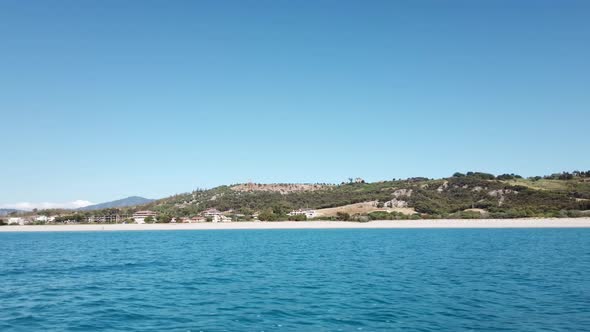 Italian coast in summer seen from the motorboat alt