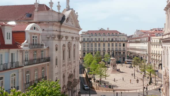 Traditional Narrow City Streets with Beautiful Architecture Surrounding City Square and Pedestrians