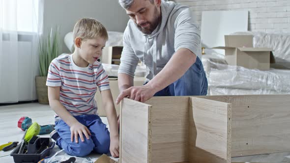 Father and Son Building Furniture, Stock Footage | VideoHive