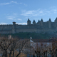 Carcassonne, the skyline of the citadel, Château Comtal and medieval buildings. - PhotoDune Item for Sale