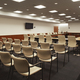 Interior view of a lecture hall or meeting room, a large conference table. - PhotoDune Item for Sale