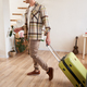 Full length photo of young man with suitcase, going on holiday trip, walking in flat, checking out - PhotoDune Item for Sale