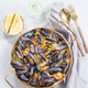 Paella with mussels and shrimps in traditional plate, vertical, top view - PhotoDune Item for Sale