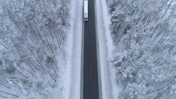 Cars Driving on Winter Road Aerial View