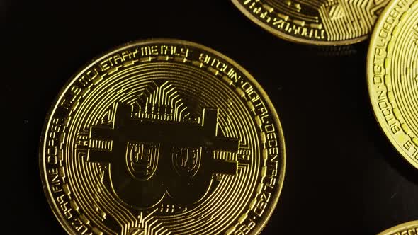 Rotating shot of Bitcoins (digital cryptocurrency) - BITCOIN 0089 alt