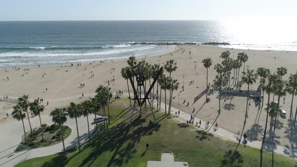 Aerial view of a park and the beach alt