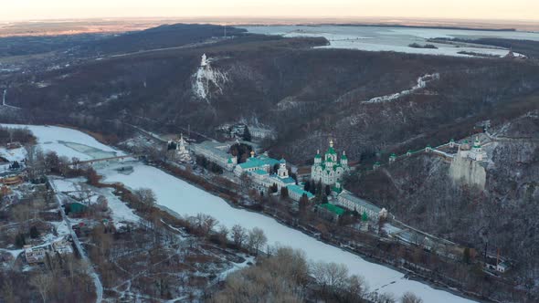 Winter flight over the Holy Dormition Svyatogorsk Lavra. Lots of churches upstairs.