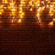 Yellow lights garlands hanging from red brick wall at evening, beautiful christmas house decoration - PhotoDune Item for Sale