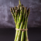 Fresh green asparagus on dark background - PhotoDune Item for Sale