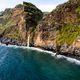 Waterfall fall into Atlantic Ocean in Madeira Island, Portugal. Aerial Drone view - PhotoDune Item for Sale