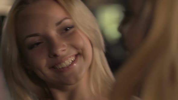 Tipsy Attractive Female Dancing Sexy, Casting Flirtatious Look and Smile Aside alt