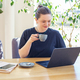 Woman Enjoying Coffee During Work From Home - PhotoDune Item for Sale