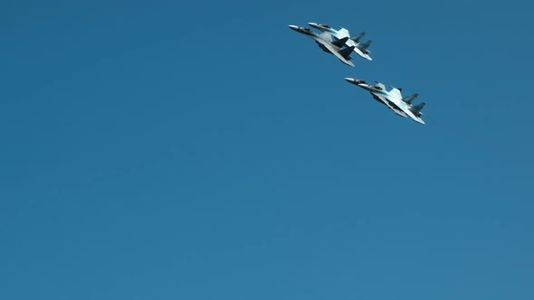 Four Fighters Maneuver in the Sky.