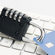 Security lock closed on credit card on computer keyboard - PhotoDune Item for Sale