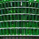 A sizable collection of green glass bottles neatly stacked on a shelf, likely awaiting industrial re - PhotoDune Item for Sale