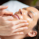 Woman at the beauty salon enjoys a rejuvenating skincare face mask treatment - PhotoDune Item for Sale