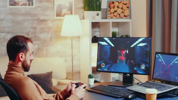 Game Developer Testing New Joystick for Shooter Game alt