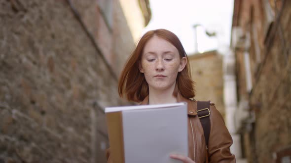 Creative Ginger Girl Sketching Buildings alt