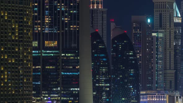 Aerial Nighttime Cityscape with Illuminated Architecture of Dubai Downtown Timelapse United Arab alt