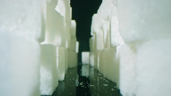 White Crystals Of Sugar In Cubes alt
