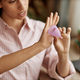 Close up of woman holding menstrual cup recording videos - PhotoDune Item for Sale