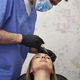 Woman having facelifting procedure done by a male doctor - PhotoDune Item for Sale