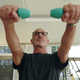 Mature Man Working out with Dumbbells - PhotoDune Item for Sale
