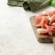 prosciutto ham on a wooden board with basil - PhotoDune Item for Sale
