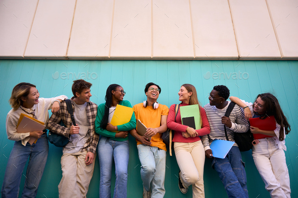 Low angle. Large group multi-ethnic and diverse students smiling ...