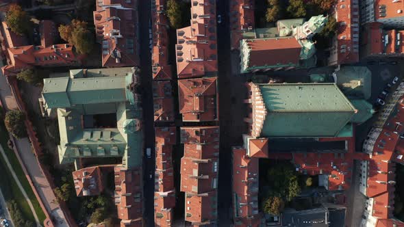 Aerial Birds Eye Overhead Top Down Panning View of Red Tiled Rooftops and Squares in Historic Centre alt