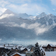 Cityscape of Brianson, ski resort in France. Mountain covered with snow and fog. Alpine landscape - PhotoDune Item for Sale