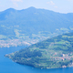 Aerial view of lake Iseo, forested mountains, various villages scattered along the mountain slopes - PhotoDune Item for Sale