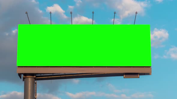 Timelapse - Blank Green Billboard and Moving White Clouds Against Blue Sky