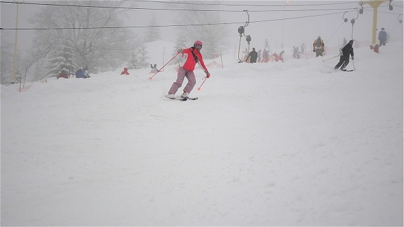 Ski Lift And Skiers On Slope 1