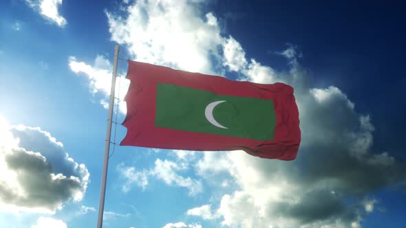 Flag of Maldives Waving at Wind Against Beautiful Blue Sky alt