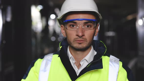 Portrait of  Heavy Industry Engineer Worker Wearing Safety Uniform Glasses and Hard Hat