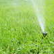 Automatic Smart Lawn Sprinkler With Adjustable Head Watering Green Lawn Grass In Sunny Day - PhotoDune Item for Sale
