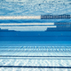 Sport Recreation: Olympic Swimming pool under water background. - PhotoDune Item for Sale