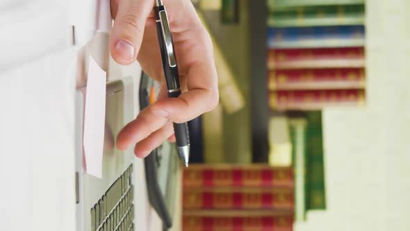 Closeup  a Man's Hand in the Office Works with a Laptop Touchpad alt