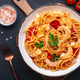 Cooked spaghetti pasta with big shrimp and tomato sauce, black table background, top view - PhotoDune Item for Sale