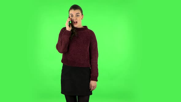 Girl Angrily Speaks on the Phone, Proves Something. Green Screen alt