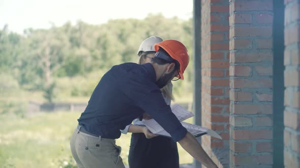 Real Estate Builder Project Architect. Builder Designer On Construction Site. Engineer Developer. alt