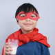 Superhero Kid Drinks Milk - PhotoDune Item for Sale