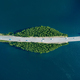 Aerial view of road through blue lake or sea with green woods in Finland. - PhotoDune Item for Sale