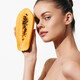 Woman holding a papaya in front of her face with hands on head, tropical fruit concept - PhotoDune Item for Sale