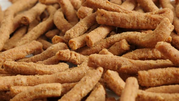 Slow pan grissini snack made of dough with chilli 4K 2160p 30fps UltraHD footage - Shallow DOF of in alt