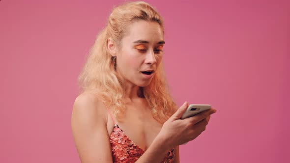 Woman Is Happy When She Received a Message About the Salary on Her Phone. alt