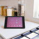 A tablet displaying smart home interface rests on a kitchen counter at home - PhotoDune Item for Sale